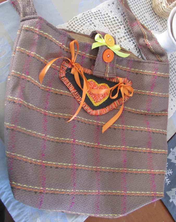 large image of art item: bag – stripes brown orange button ribbon