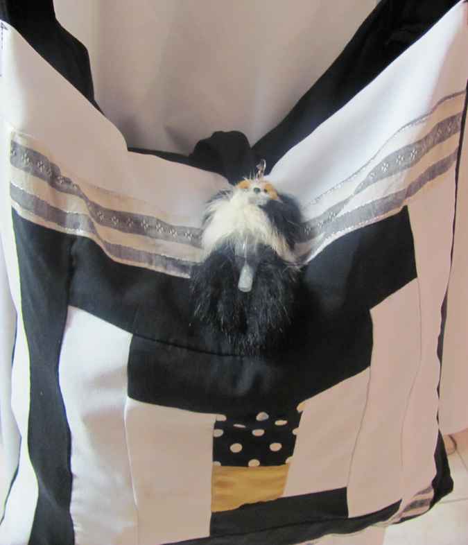 large image of art item: bag – white and black squares