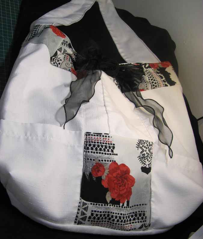 large image of art item: bag – white flower red ribbon black