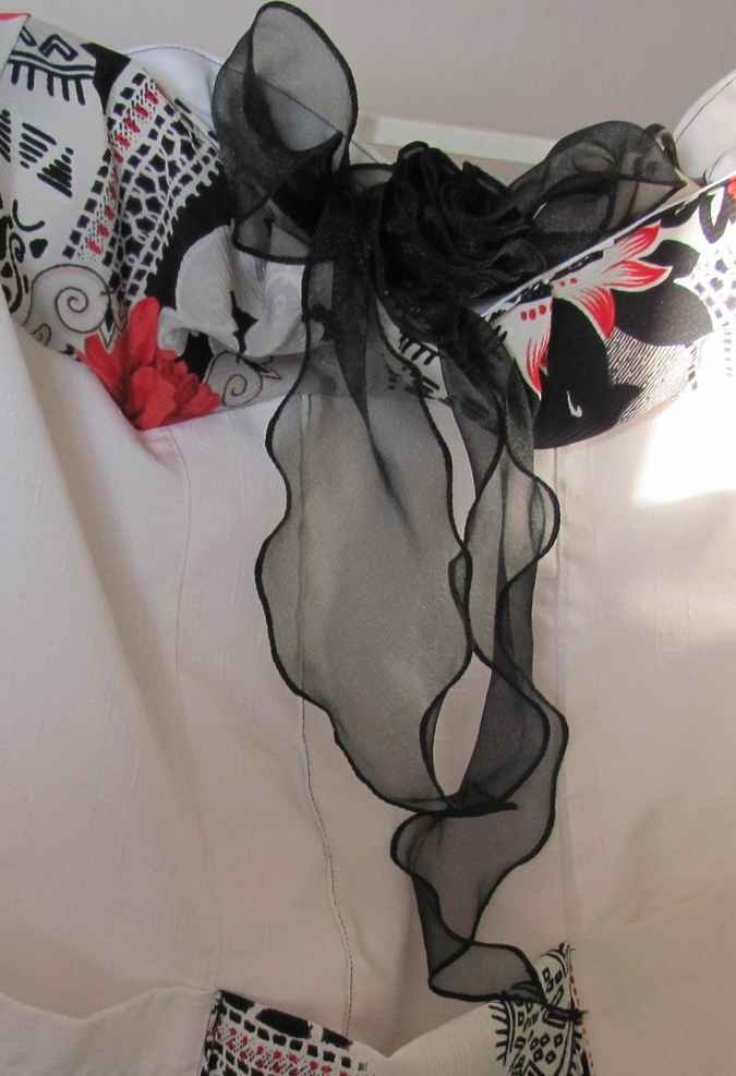 large image of art item: bag – white flower red ribbon black