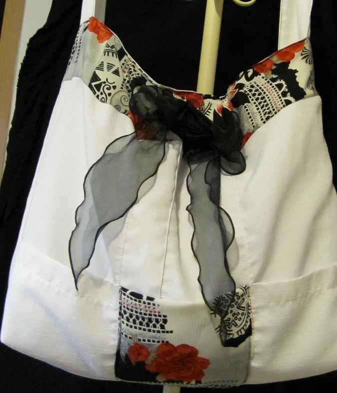 large image of art item: bag – white flower red ribbon black