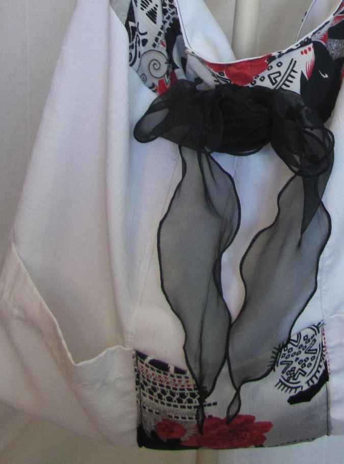 large image of art item: bag – white flower red ribbon black