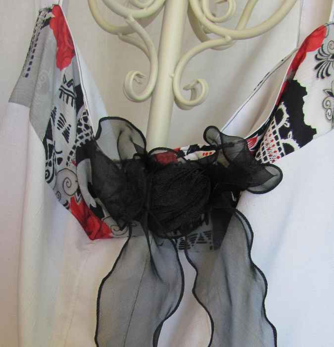 large image of art item: bag – white flower red ribbon black