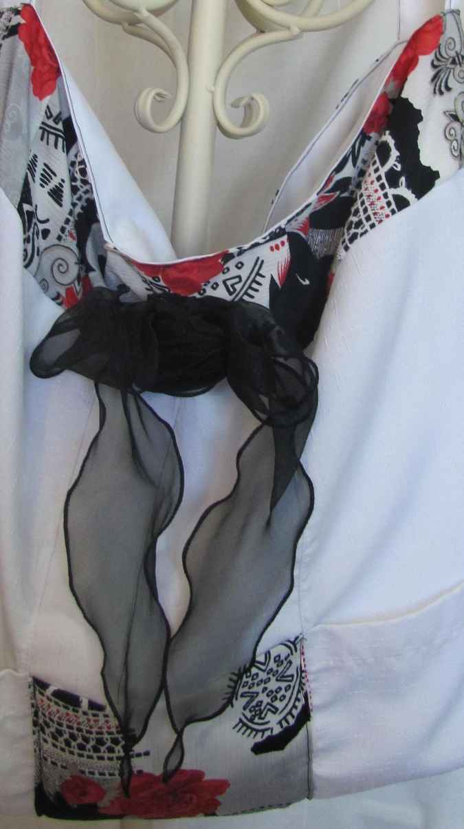 large image of art item: bag – white flower red ribbon black