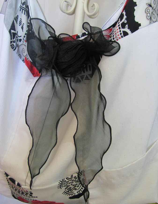 large image of art item: bag – white flower red ribbon black