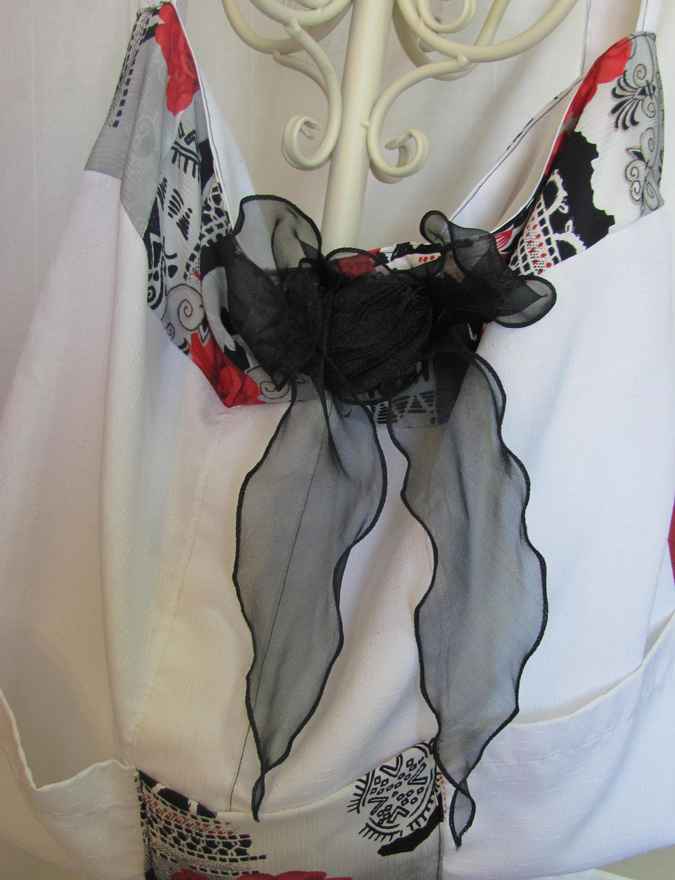 large image of art item: bag – white flower red ribbon black
