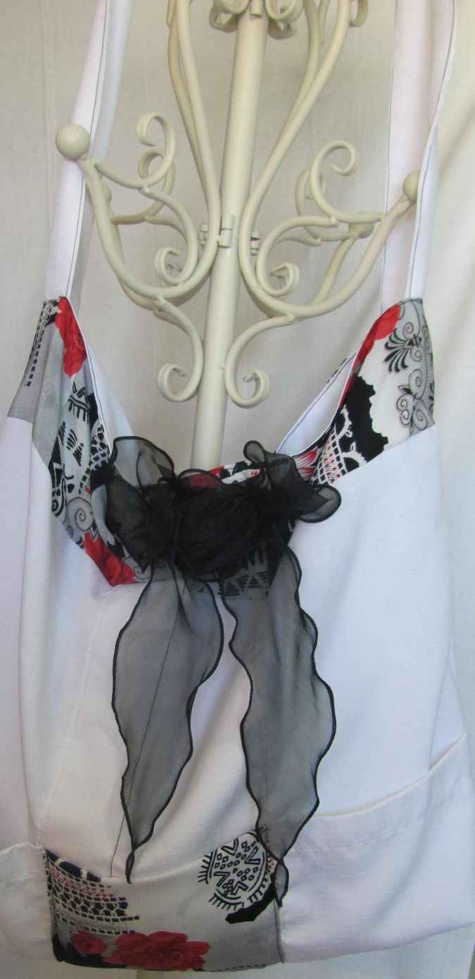 large image of art item: bag – white flower red ribbon black