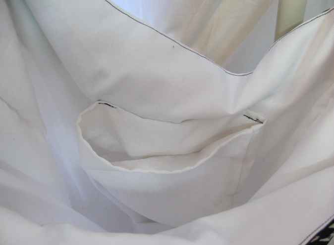 large image of art item: bag – white flower red ribbon black
