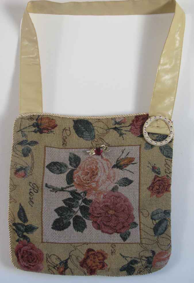 large image of art item: bag – yellow embroided flowers red pink blue