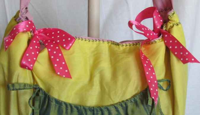 large image of art item: bag – yellow pouch green