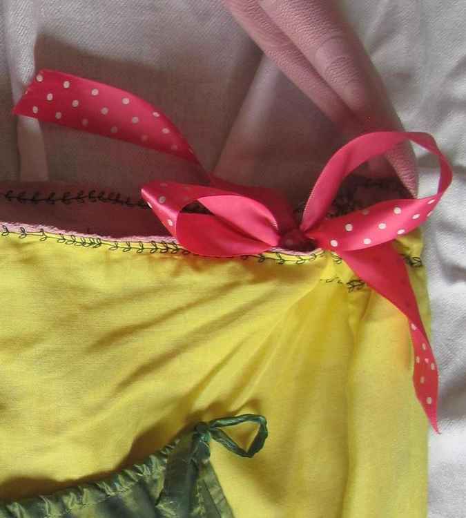 large image of art item: bag – yellow pouch green