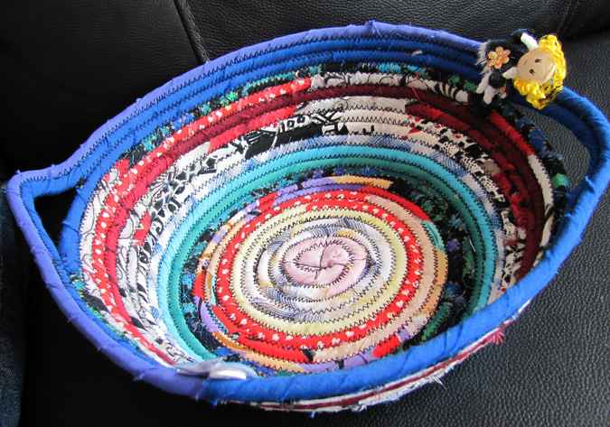 large image of art item: basket – apple doll blue red white