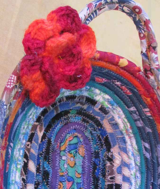 large image of art item: basket – crochet flowers red blue