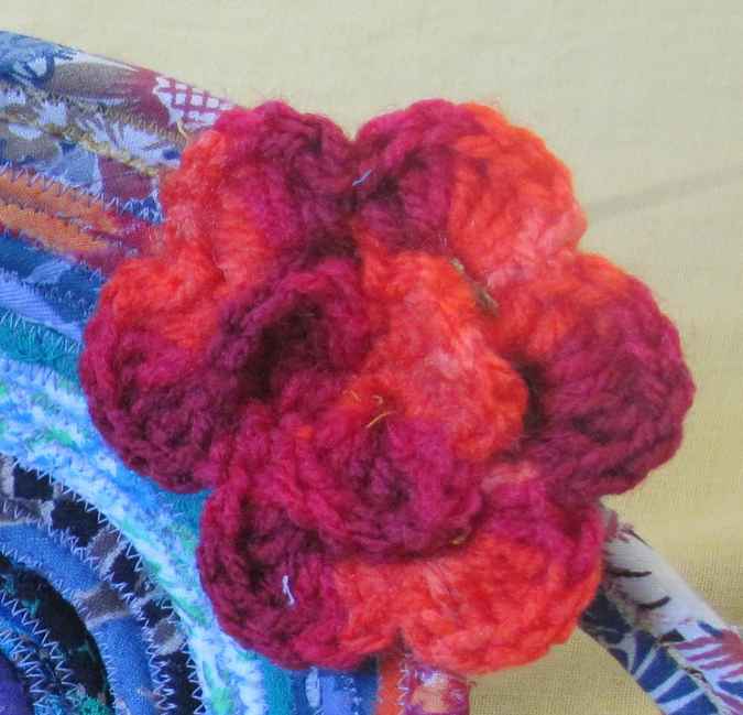large image of art item: basket – crochet flowers red blue