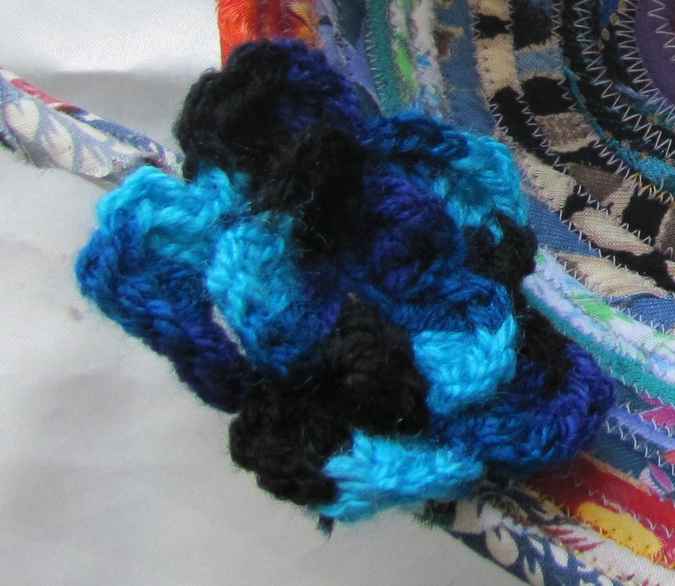 large image of art item: basket – crochet flowers red blue