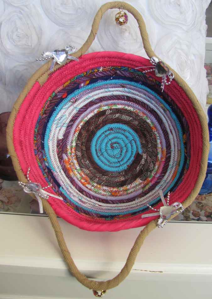 large image of art item: basket – cyan center pink perimeter diamond hearts