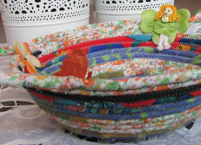 large image of art item: basket – fairy flowers cyan yellow red