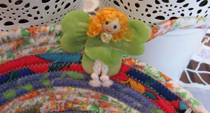 large image of art item: basket – fairy flowers cyan yellow red