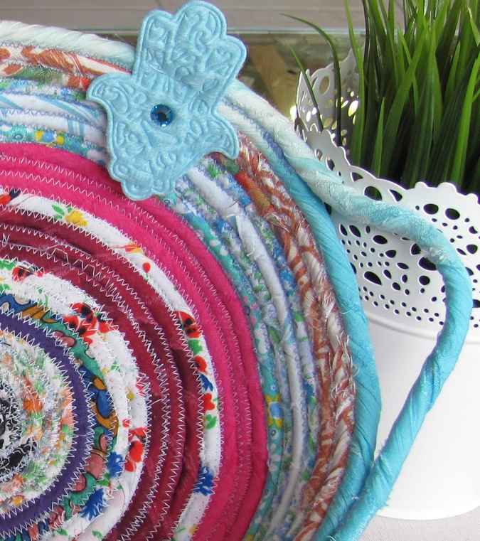 large image of art item: basket – hamsa cyan pink red