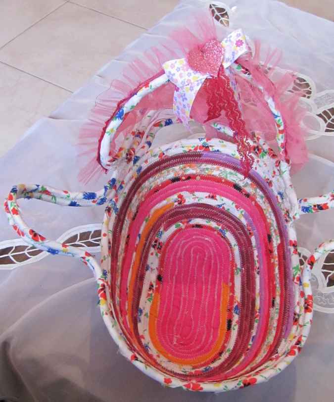 large image of art item: basket – baby doll cradle pink