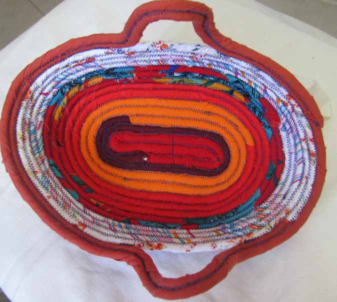 large image of art item: basket – long red orange