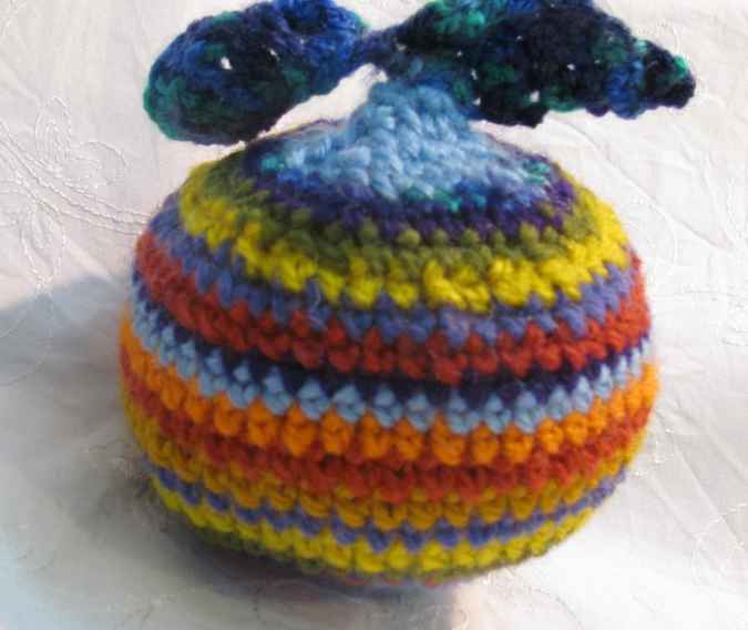 large image of art item: doll – apple crochet