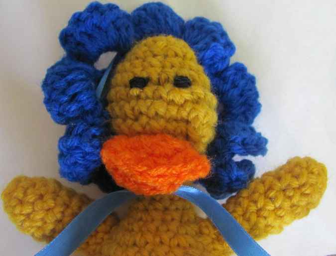 large image of art item: doll – baby chick crochet