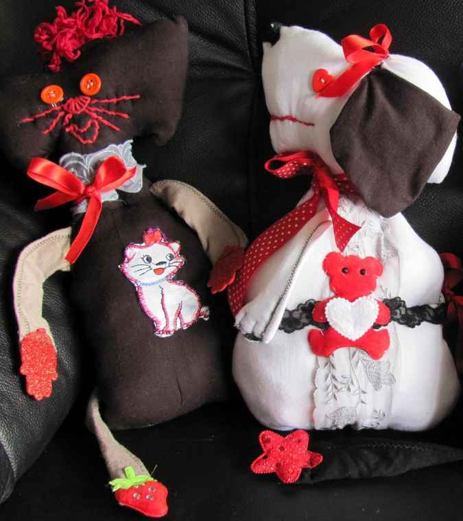 large image of art item: doll – cat and dog quilt