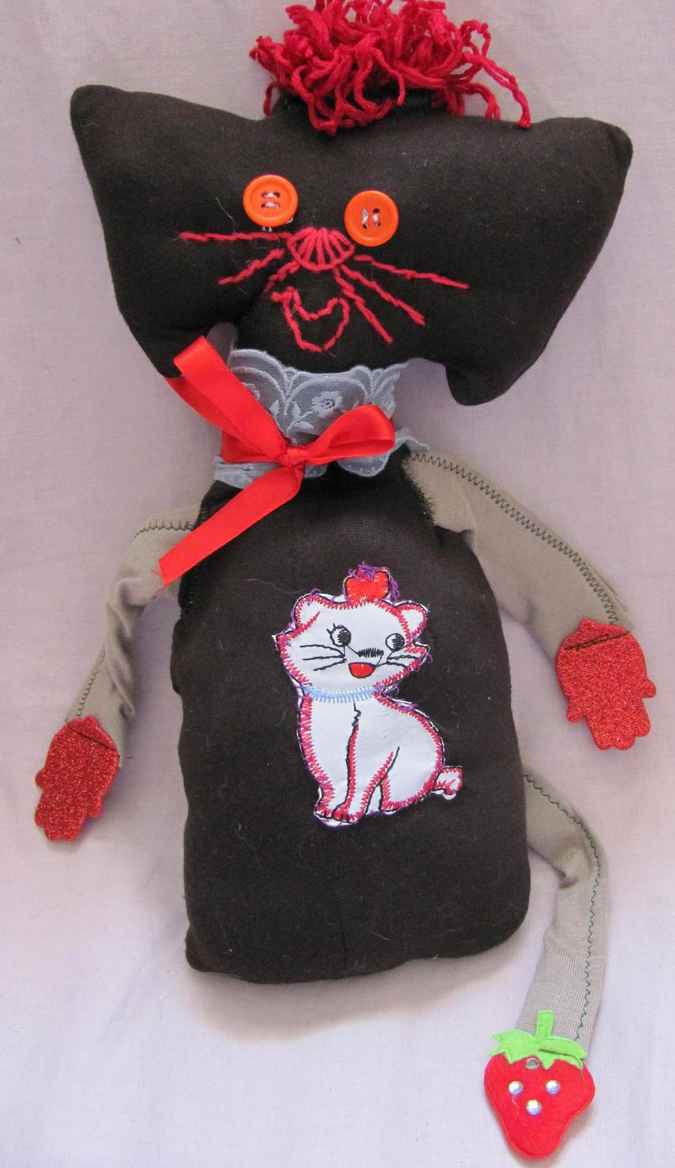 large image of art item: doll – cat and dog quilt