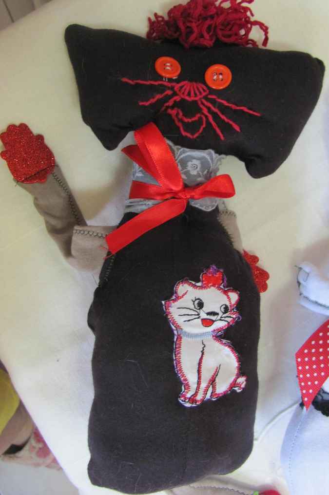 large image of art item: doll – cat and dog quilt