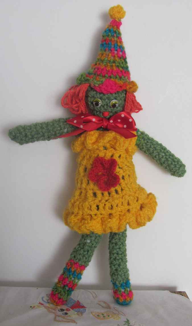 large image of art item: doll – clown yellow red colorful hat
