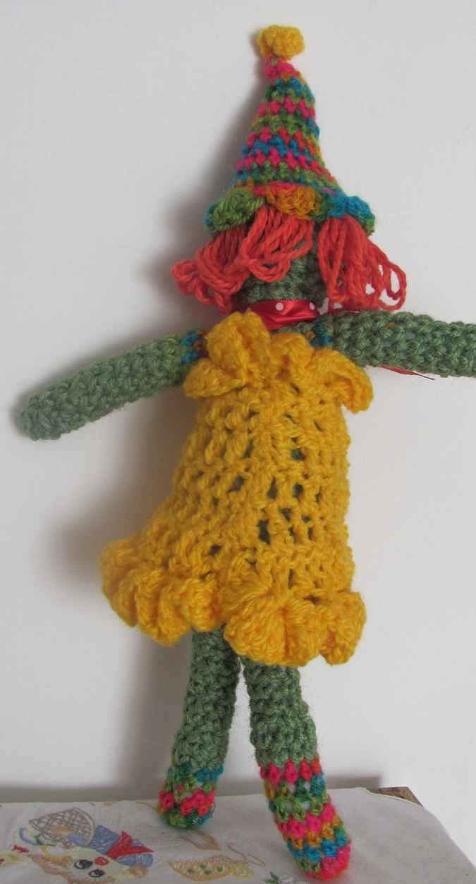 large image of art item: doll – clown yellow red colorful hat