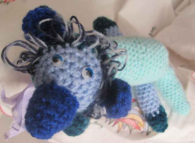large image of art item: doll – dog cyan blues