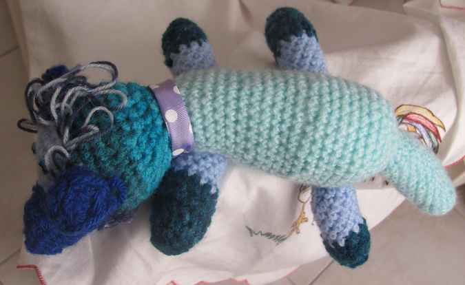 large image of art item: doll – dog cyan blues
