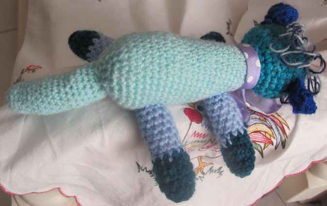 large image of art item: doll – dog cyan blues