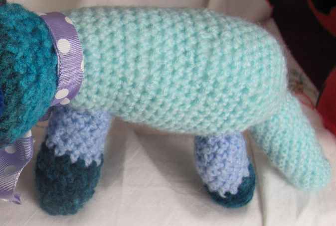 large image of art item: doll – dog cyan blues