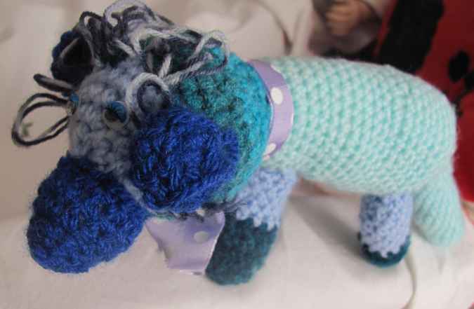 large image of art item: doll – dog cyan blues