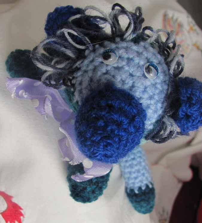 large image of art item: doll – dog cyan blues