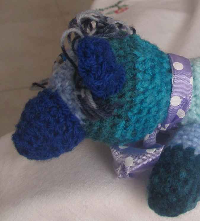 large image of art item: doll – dog cyan blues