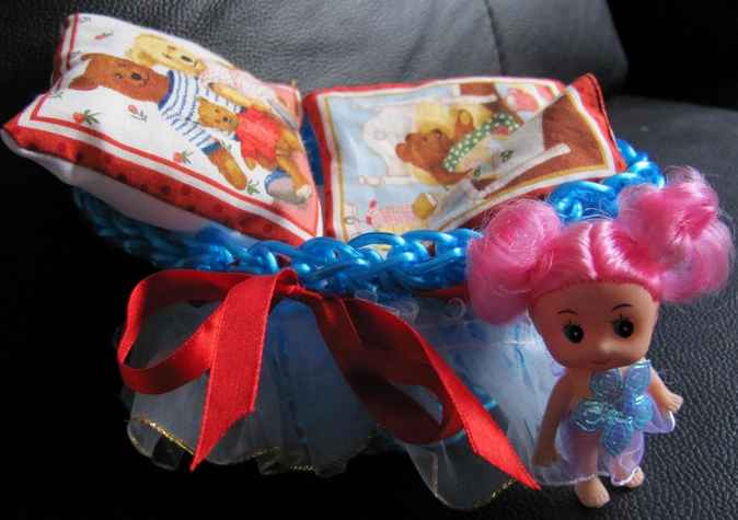 large image of art item: doll – doll with crocheted cradle