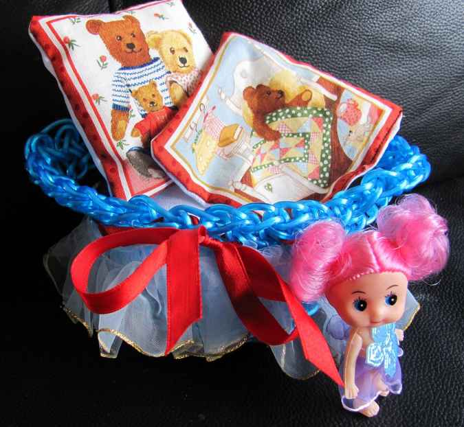 large image of art item: doll – doll with crocheted cradle