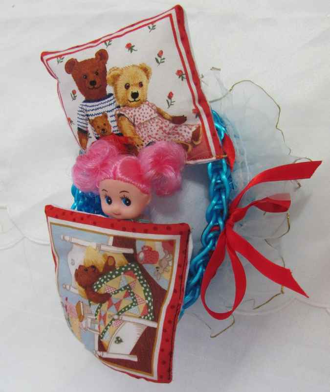 large image of art item: doll – doll with crocheted cradle