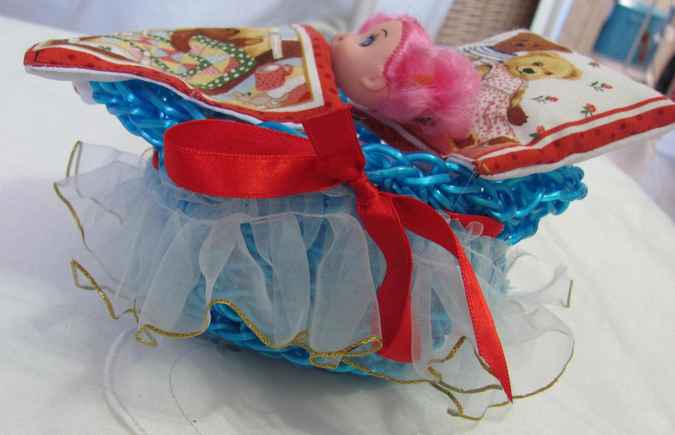 large image of art item: doll – doll with crocheted cradle