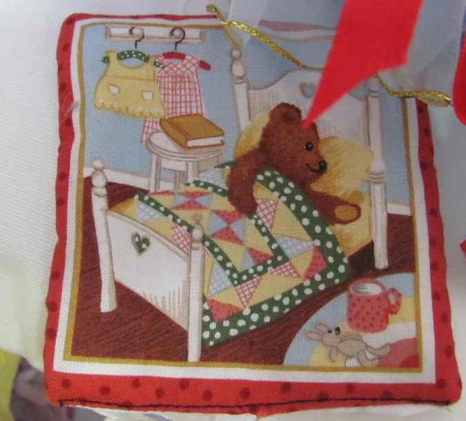 large image of art item: doll – doll with crocheted cradle