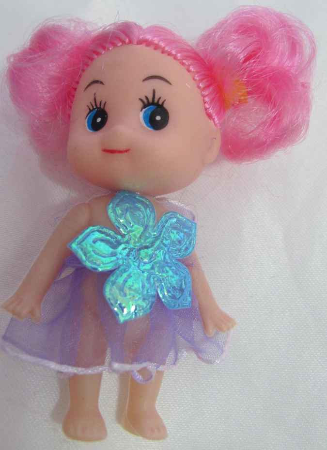large image of art item: doll – doll with crocheted cradle