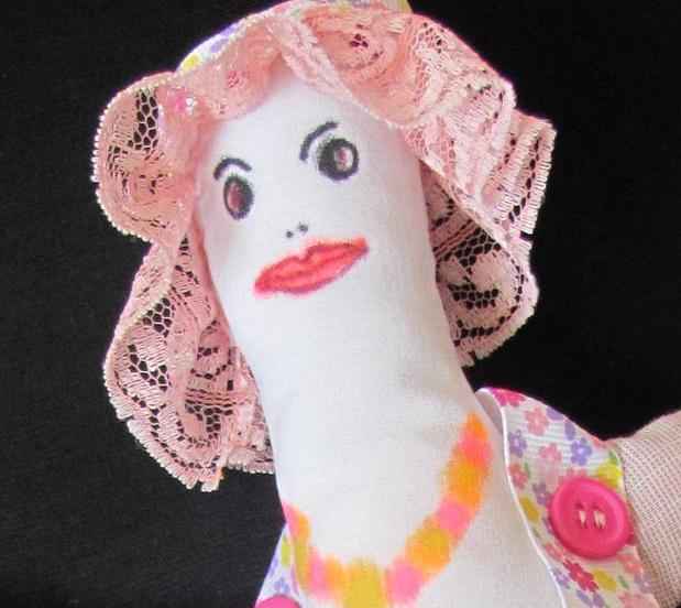 large image of art item: doll – doll with lace