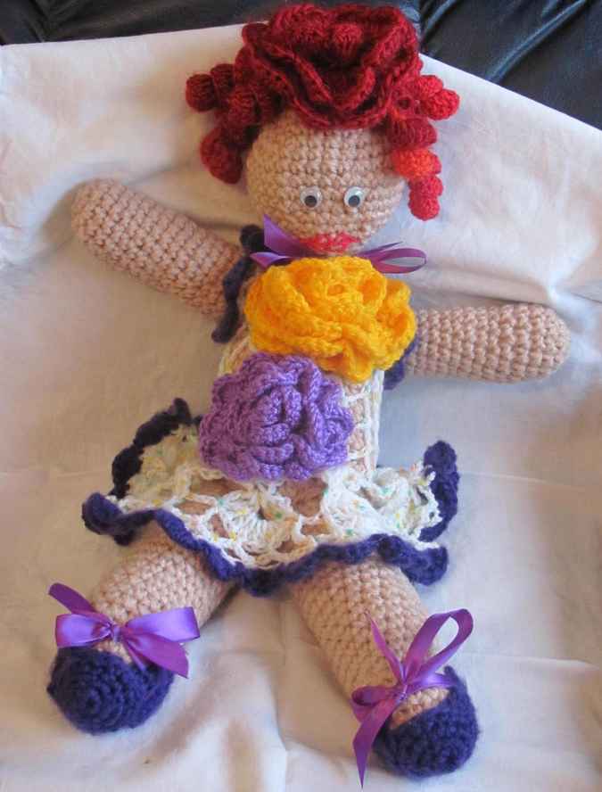 large image of art item: doll – dress with flowers crochet