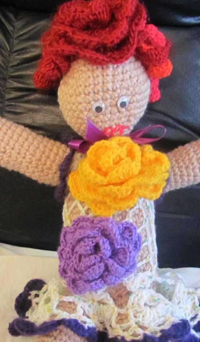 large image of art item: doll – dress with flowers crochet