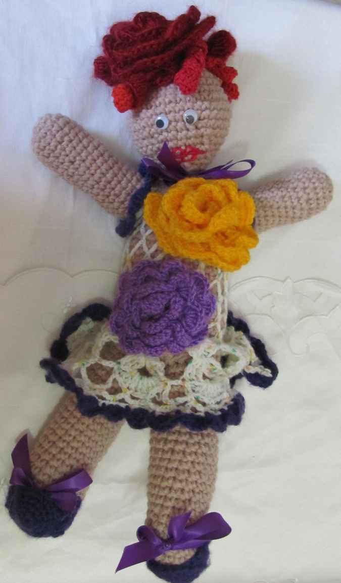 large image of art item: doll – dress with flowers crochet