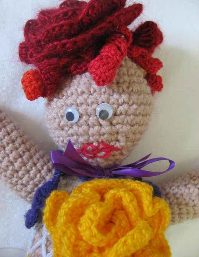 large image of art item: doll – dress with flowers crochet